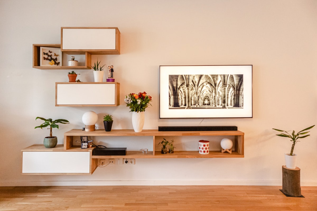 Floating timber TV console with open shelving and concealed storage