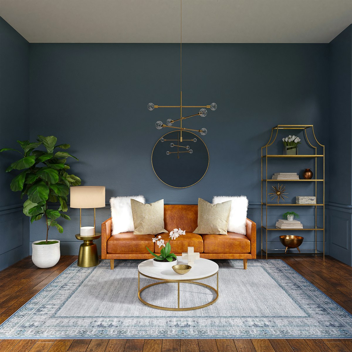 Condominium living room with navy walls, tan leather sofa and brass details